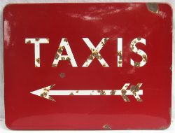 BR(M) FF enamel railway station sign TAXIS with arrow. Slight rusting on letters. Measures 24in