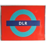 DOCKLANDS LIGHT RAILWAY Roundel on a panel in ex service condition.