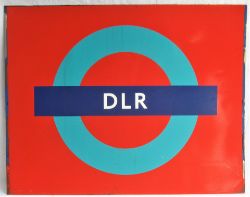 DOCKLANDS LIGHT RAILWAY Roundel on a panel in ex service condition.