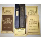 A lot containing various GWR timetables and maps. 2 x bound volumes 1938 and 1925 including others