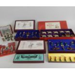 A large collection of Britains and other military lead figures, mainly in boxed sets and limited