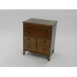 A George III style mahogany cabinet, converted from a 19th century commode, the moulded top above