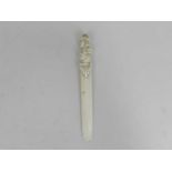 A carved ivory page turner, late 19th century, the handle modelled as the Duke of Wellington, 24.5cm