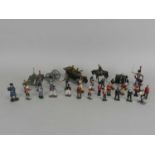 A quantity of mixed lead model soldiers, various makers and including eight artillery pieces,
