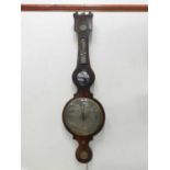 A 19th century mahogany banjo mercury barometer and weather station, with silvered dial, humidity