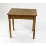 An Edwardian pine lowboy type table, with single frieze drawer, 67cm wide, 76cm high, 50cm deep.