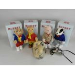 Four Steiff Rupert the Bear teddy bears: Podgy Pig, Algy Pug, Bill Badger, and Rupert, all boxed