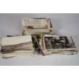 A Box of Edwardian and later postcards, photographs and greetings cards