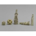 Two Chinese carved ivory figures, two puzzle balls, one lacking majority of concentric balls, a doub