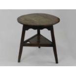 An early 19th century elm cricket table