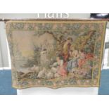 An 18th century style tapestry wall hanging, machine woven, worked with a scene of a rustic boy
