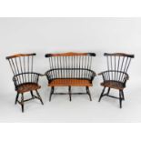 Three model or apprentice chairs, of 'comb-back' Windsor type in stained wood, including two open