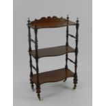 A Victorian mahogany 3-tier serpentine fronted whatnot, 60cm wide x 30cm deep x 98cm highCondition