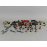 A group of lead figures and a group of die-cast vehicles, unboxed and play worn, including Timpo