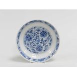 A Chinese blue and white dish, Guangxu six-character mark and of the period, of plain round form and