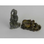 Two Chinese soapstone carvings, 19th century, the first of Shoulao in kneeling pose, 15cm high (at