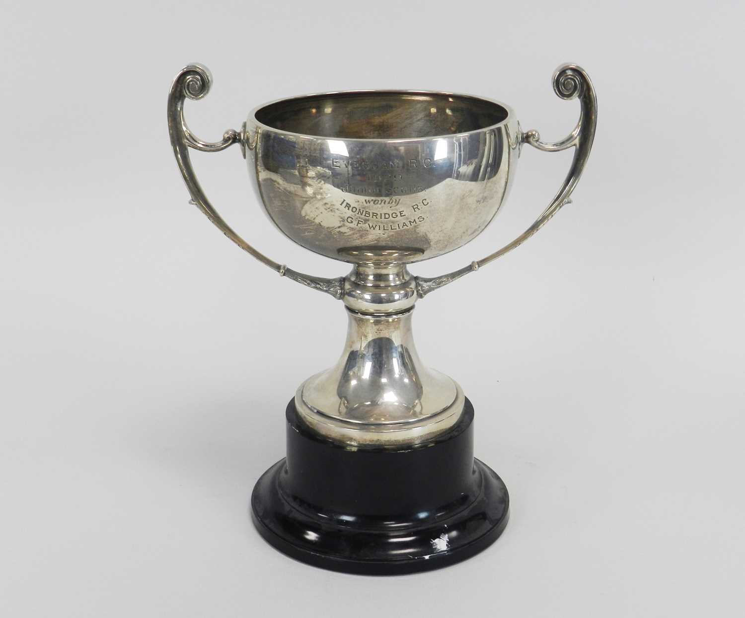 A silver presentation two handled trophy cup