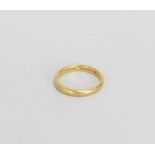 A 22ct gold plain polished wedding band