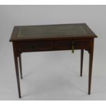 An assembled group of Edwardian mahogany furniture, including a cross-banded writing table with