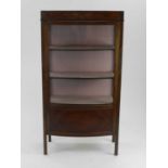 An Edwardian inlaid mahogany bow-front glazed display cabinet, 68cm wide, 147cm high, 37cm deep.