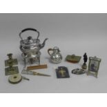 An assembled group of metalware and electroplate including a spirit kettle on stand, a Guernsey-type