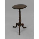 A Victorian mahogany wine tripod table, 73cm high, and a reproduction mahogany torchere stand, 101cm