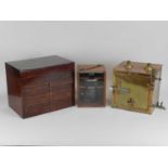 An early/mid 20th century mahogany-cased dental surgery kit, including various implements and