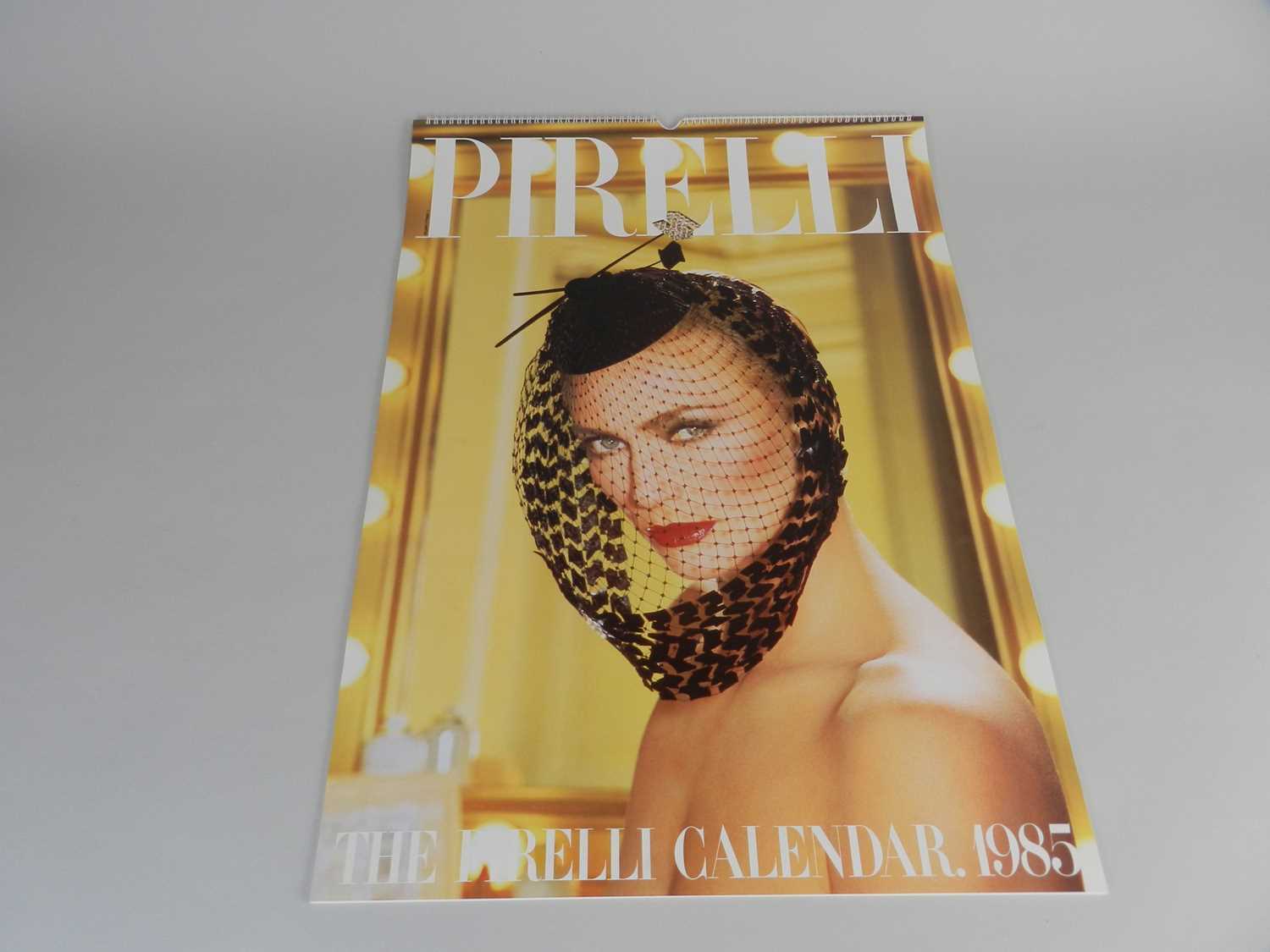 A collection of twelve Pirelli calendars including 1969 and 80-90s.