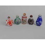 Five Chinese cameo glass snuff bottles, 20th century, including two with internally painted