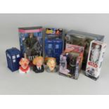 A collection of film and TV tie-in action figures and accessories including Dr Who, Lord of the
