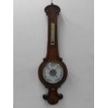 A late Victorian mahogany banjo mercury barometer, with white earthenware dial, 93cm, together
