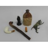 An assembled group of works of art, 19th to 20th century, including a bronze dog stirrup cup, a