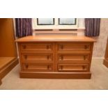 A Clive Christian light oak chest of six short drawers, the moulded top above double series panel-