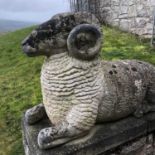 A Simon Winter carved stone figure of a recumbent ram, near life size and naturalistically carved,