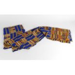 West African Ghana tribal Ewe blue kente textile cloth, woven with yellow and red geometric grid
