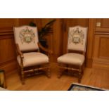 A set of ten (8+2) joined oak and armorial upholstered dining chairs, the padded backs with arched