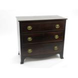 An early 19th century mahogany chest of drawers