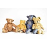 A collection of five English teddy bears