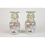 A pair of Chinese Canton famille rose vases, 19th century, of ovoid form with lobed rims and gilt