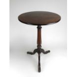 A 19th century mahogany tripod table