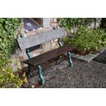 Two painted cast iron and plank-slatted rustic garden benches.125cm and 120cm wide (2)Footnote: