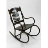 Gustav Siegal for Jacob & Joseph Kohn, a stained beech bentwood rocking chair, designed circa
