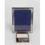 A rectangular silver mounted photograph frame