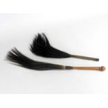 Two South African tribal Zulu fly whisks, the first with wire-wrapped handle and dark brown horse