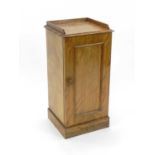 A Victorian satin birch pot cupboard