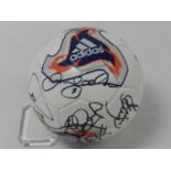 FOOTBALL SIGNED BY THE ENGLAND WORLD CUP TEAM FROM 2002. 12 signatures including David Beckham,