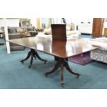 A Regency and later mahogany twin pedestal, extending dining table