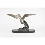 After Irene Rochard, seagull in flight over a wave, painted metal art deco figure, set on an oval