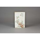 A Chinese porcelain plaque, Republic period, of rectangular outline and painted in the manner of