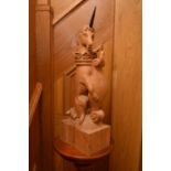 A set of three carved oak armorial figures, late 20th century, modelled as a lion, a griffin and a